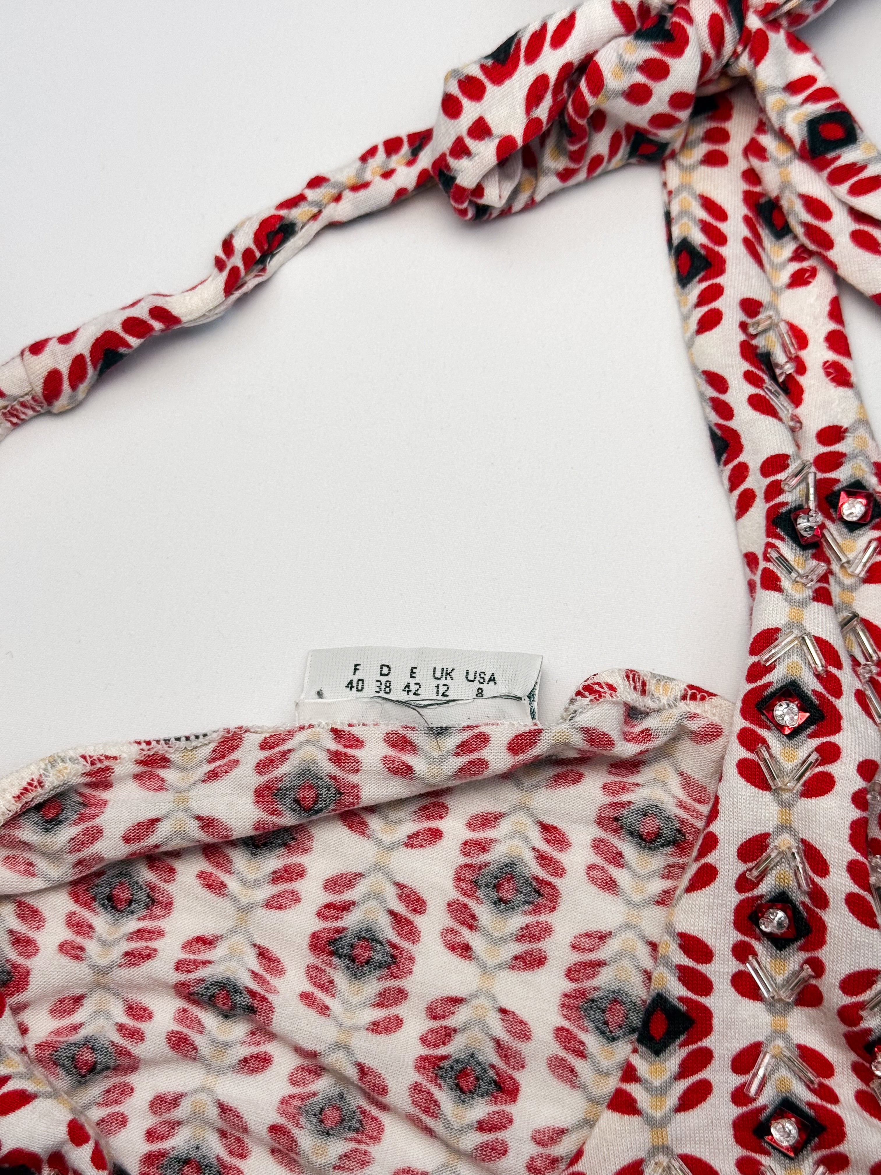 Red geometric print halter top and ruffle skirt set, crystal beading