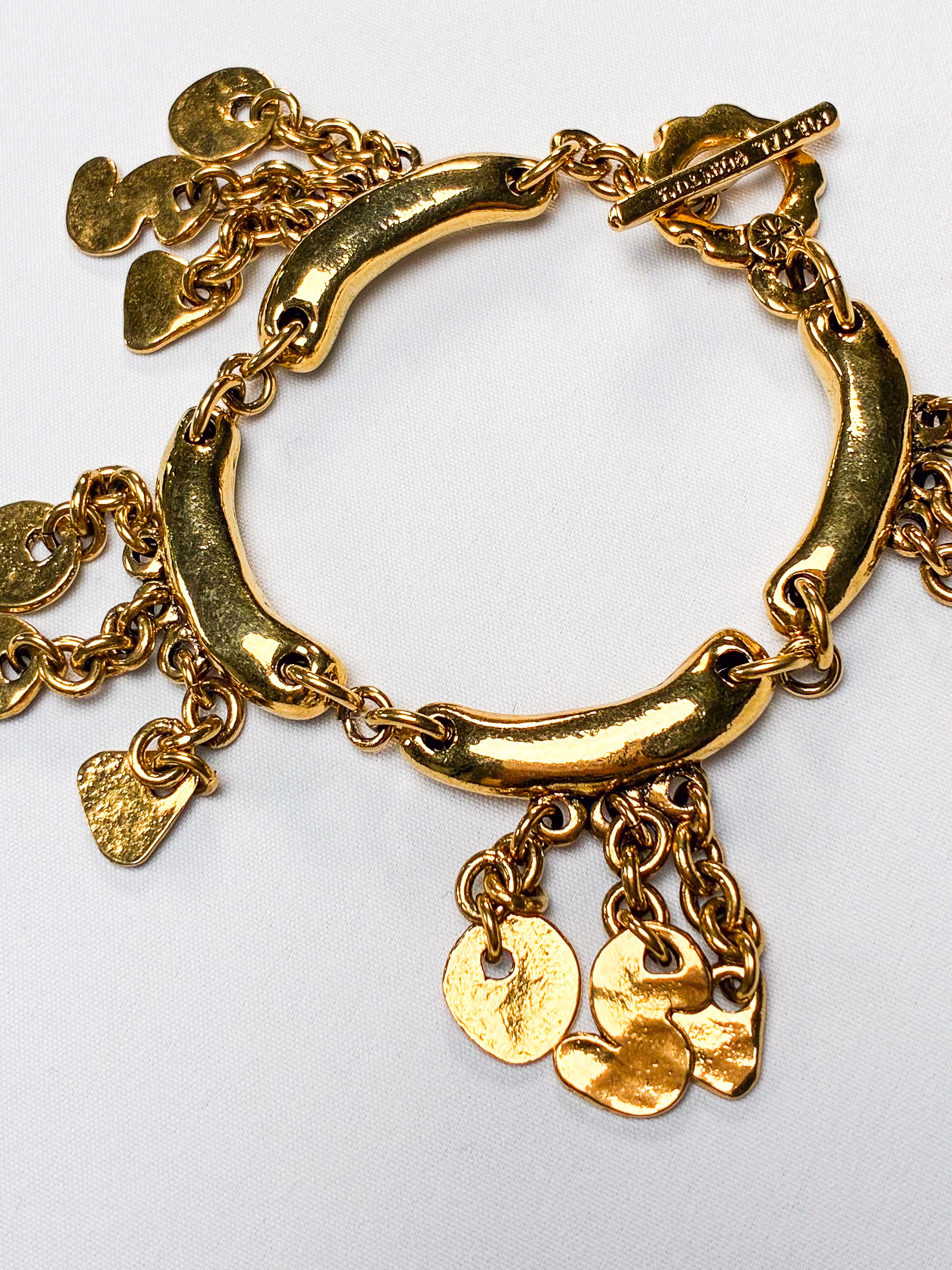 Metal Pointu's Paris 1990s Gold-Tone Bar & Charm Bracelet