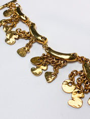 Metal Pointu's Paris 1990s Gold-Tone Bar & Charm Bracelet