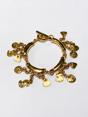 Metal Pointu's Paris 1990s Gold-Tone Bar & Charm Bracelet