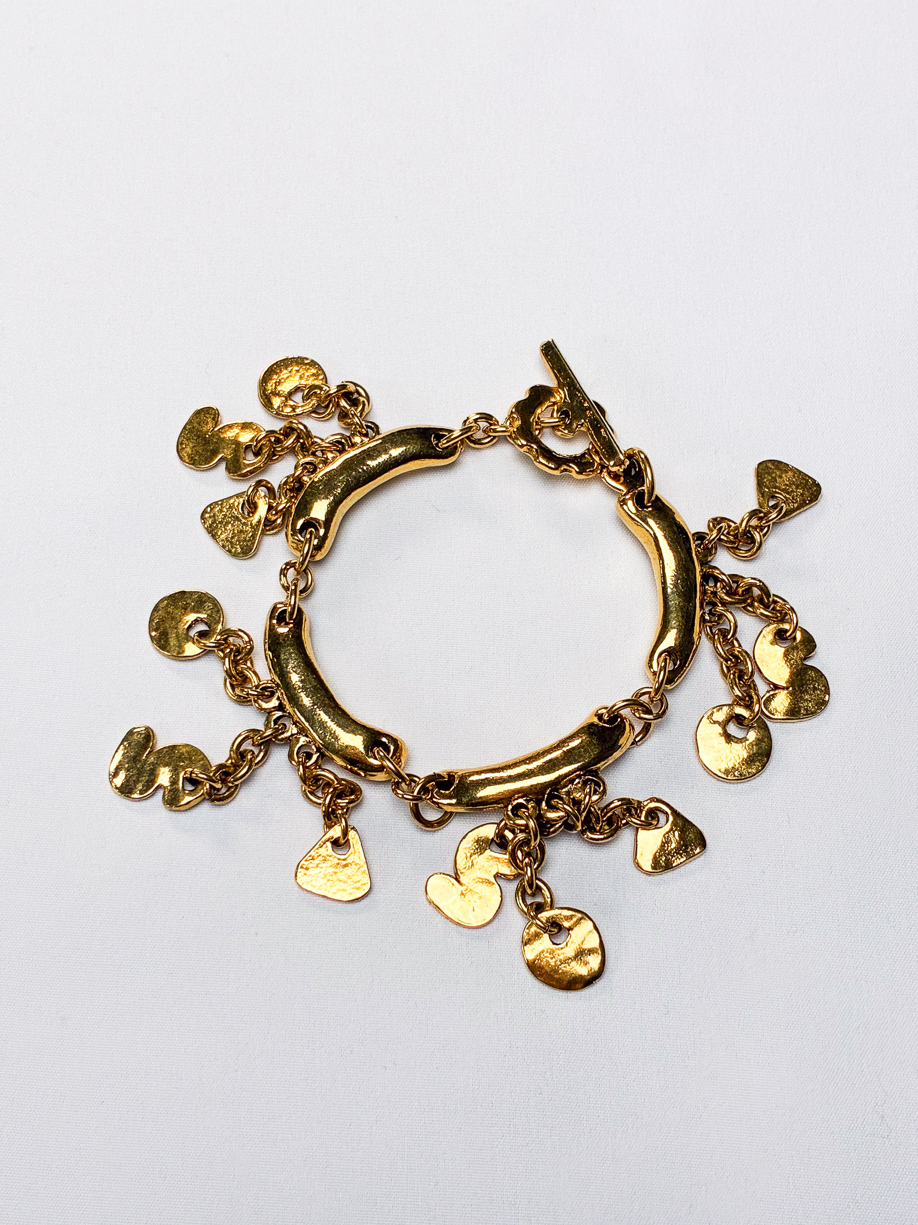 Metal Pointu's Paris 1990s Gold-Tone Bar & Charm Bracelet