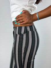 2000s Black and Cream Striped Low-Rise Flare Pants - W25